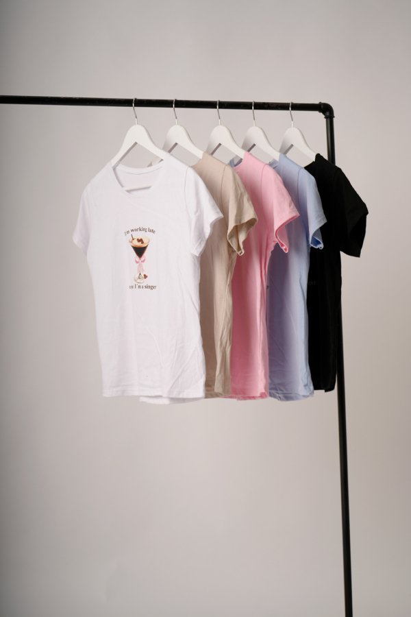 Remera manga corta jersey estampa copa con moño "SINGER"