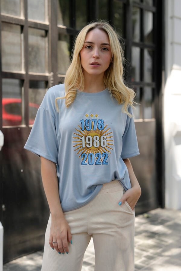 Remera boxy ribb sol y fechas en DTF "CAMPEON"