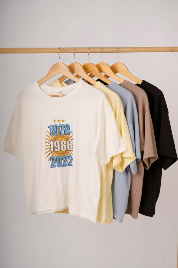 Remera boxy ribb sol y fechas en DTF "CAMPEON"