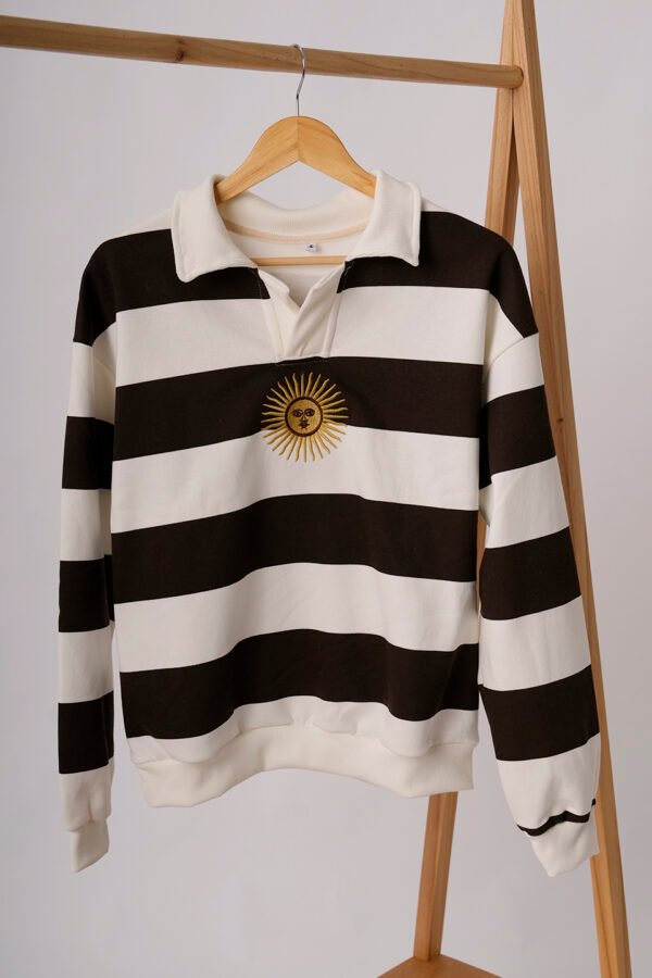 Buzo chomba rayado frisado sol de mayo bordado "DENTY"